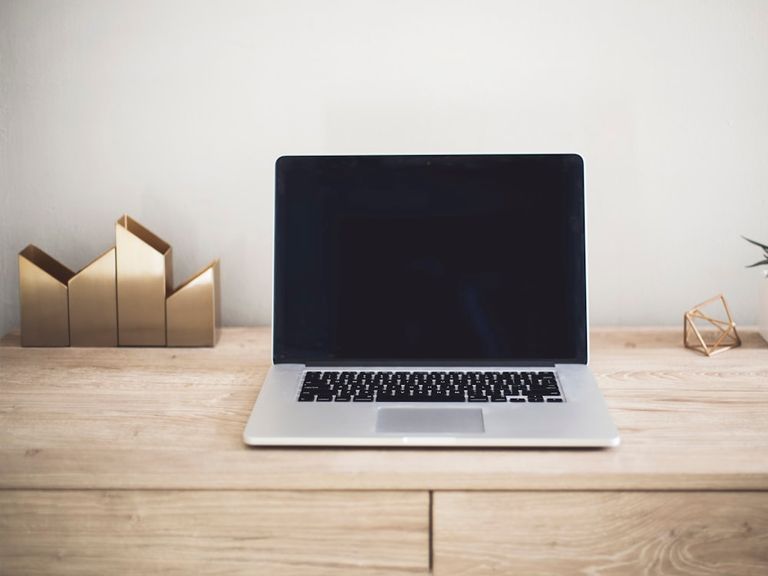 Business laptop open on a desk